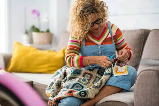 young woman knitting - featured image