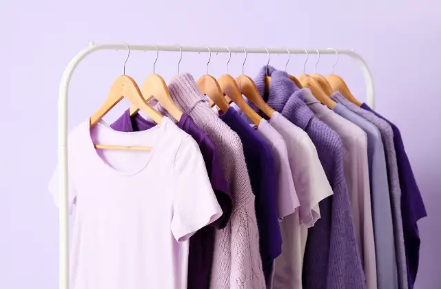 lilac colored clothes on a rack - featured image